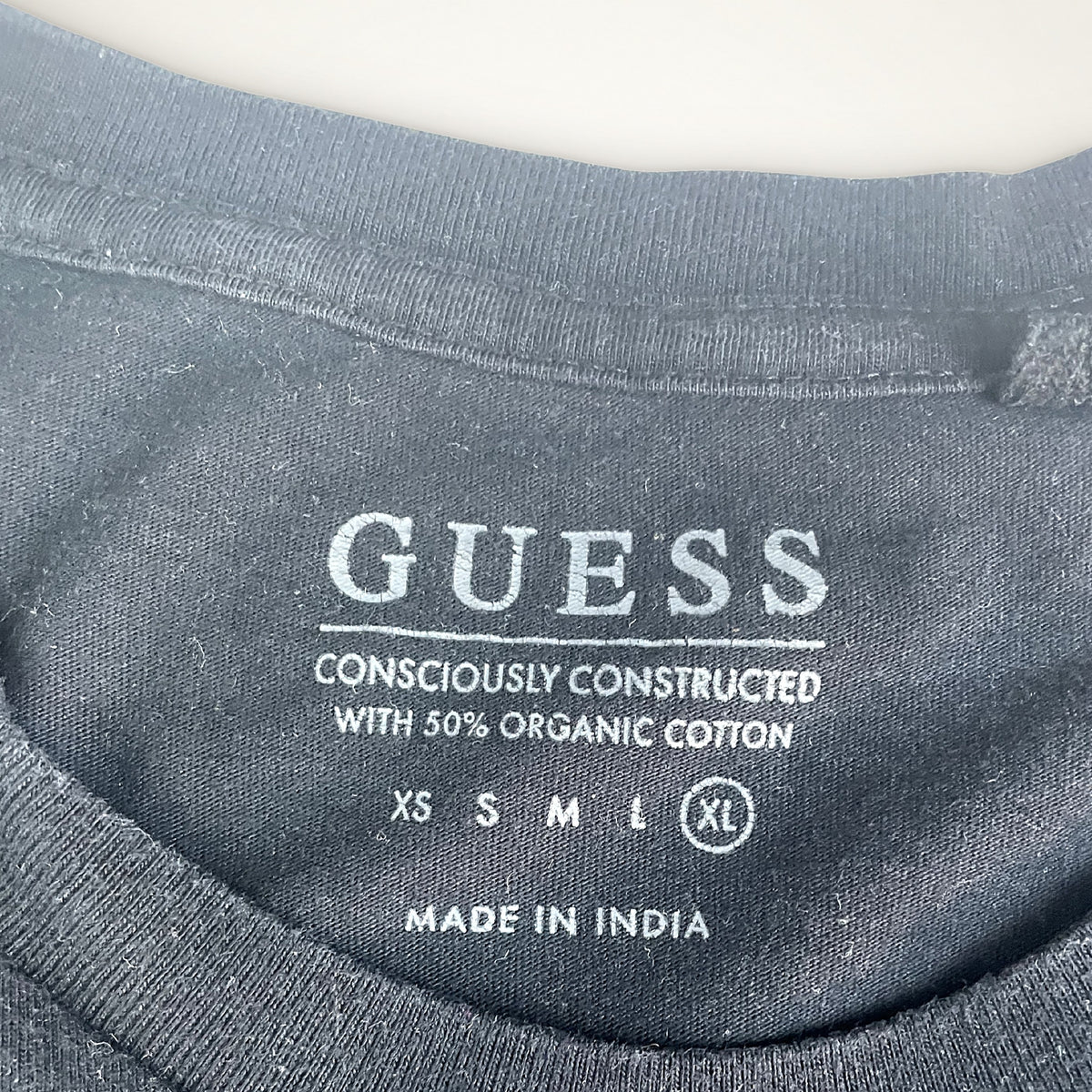 Guess Embossed Triangle Logo Tee (Black)